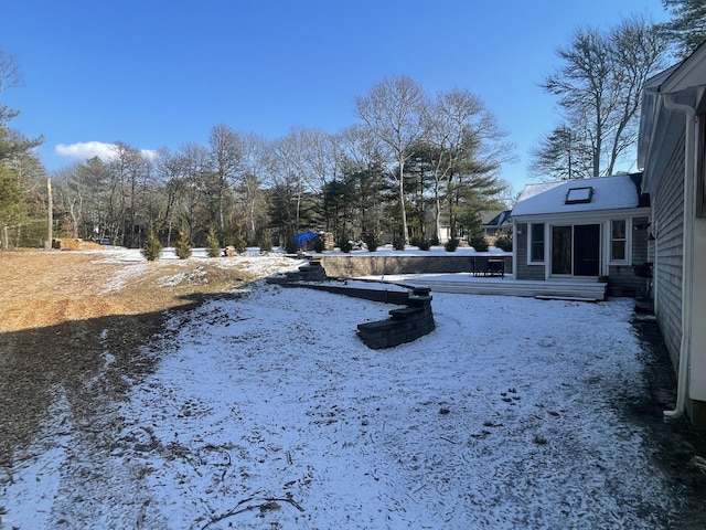 view of yard covered in snow