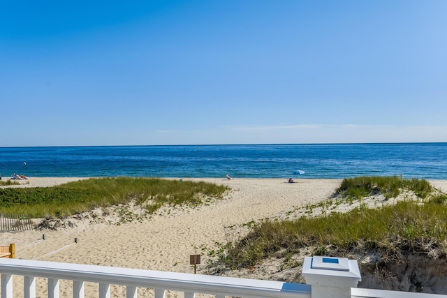 view of water feature with a beach view