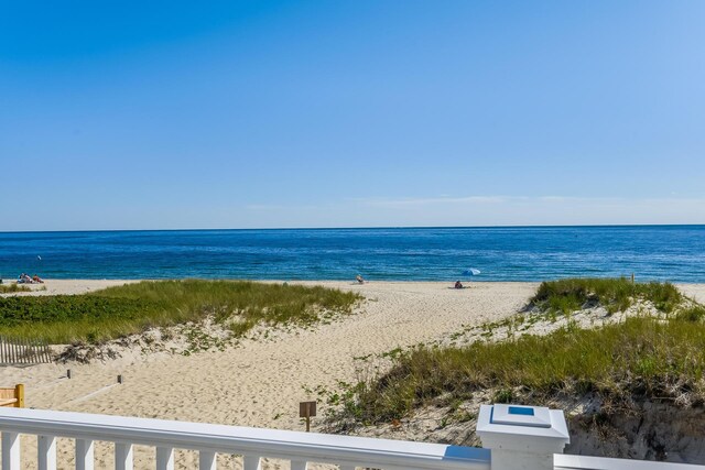 view of water feature with a beach view