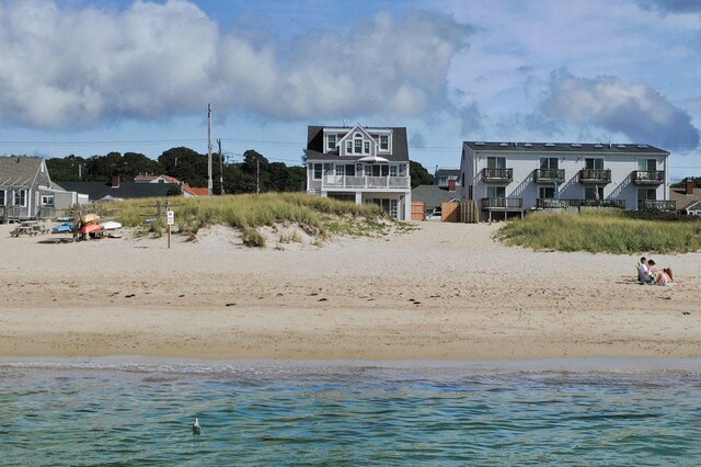 property view of water featuring a beach view