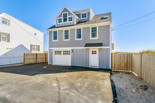 view of front of property with a garage