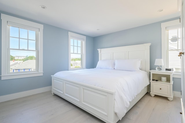 bedroom featuring light hardwood / wood-style flooring