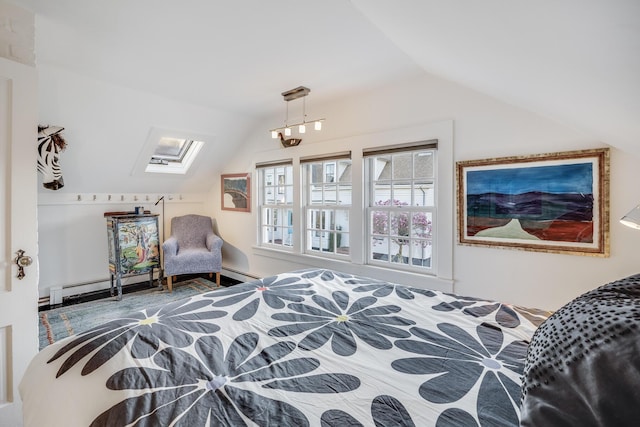 bedroom with lofted ceiling, a skylight, and a baseboard radiator