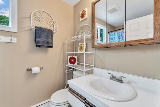 111 School St Unit 6, West Dennis, MA 02670 - full bath with vanity and a baseboard heating unit