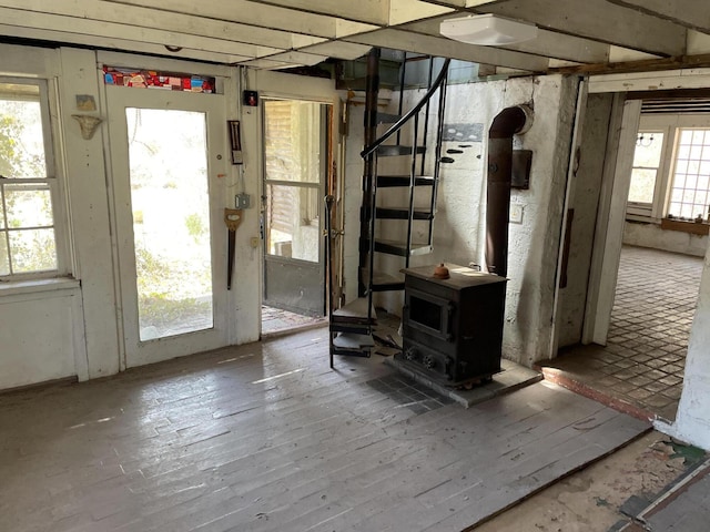 15 Cabral Farm Rd, Truro, MA 02666 - basement with stairway and a wood stove