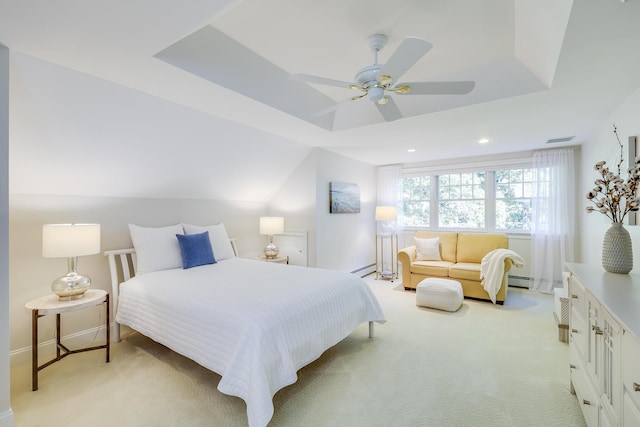 carpeted bedroom with a raised ceiling, ceiling fan, lofted ceiling, and baseboard heating