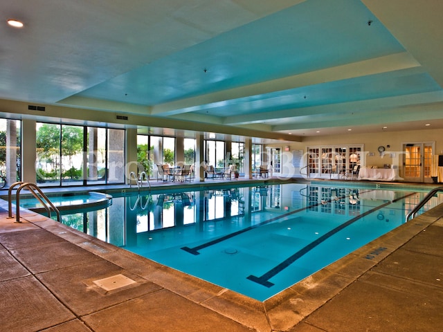 view of pool featuring a pool with connected hot tub