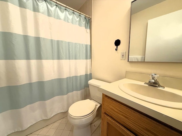 40 Eaton Ln, Brewster, MA 02631 - bathroom featuring tile patterned flooring, toilet, vanity, and curtained shower