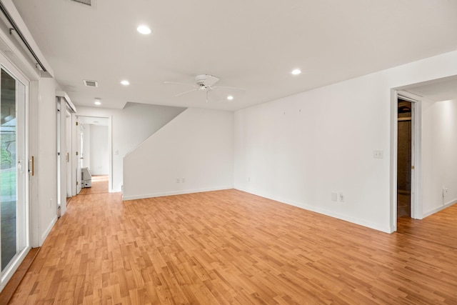 47 Cove View Dr, South Yarmouth, MA 02664 - empty room with light wood finished floors, ceiling fan, recessed lighting, and baseboards