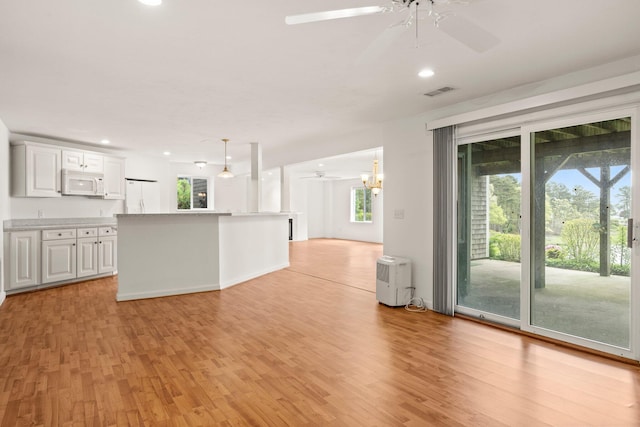 47 Cove View Dr, South Yarmouth, MA 02664 - unfurnished living room featuring ceiling fan, light wood-type flooring, and recessed lighting