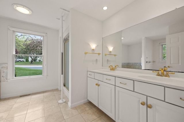 47 Cove View Dr, South Yarmouth, MA 02664 - full bathroom with plenty of natural light, double vanity, a shower with shower door, baseboards, and recessed lighting