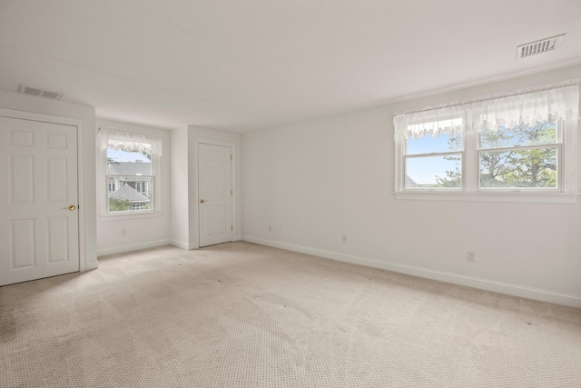 47 Cove View Dr, South Yarmouth, MA 02664 - unfurnished room featuring baseboards, light colored carpet, and healthy amount of natural light