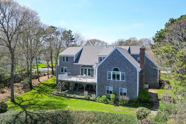 47 Cove View Dr, South Yarmouth, MA 02664 - back of house featuring a wooden deck, a chimney, stairs, a lawn, and a shingled roof