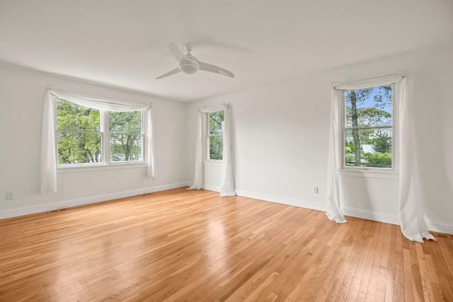 47 Cove View Dr, South Yarmouth, MA 02664 - spare room with light wood finished floors, a ceiling fan, and baseboards