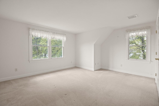 47 Cove View Dr, South Yarmouth, MA 02664 - bonus room with plenty of natural light, light carpet, and baseboards
