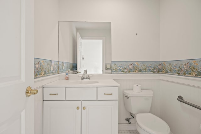 47 Cove View Dr, South Yarmouth, MA 02664 - bathroom featuring a wainscoted wall, toilet, and vanity