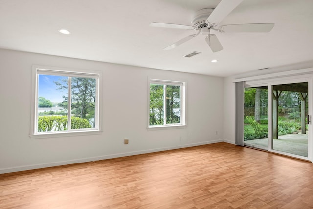 47 Cove View Dr, South Yarmouth, MA 02664 - spare room with plenty of natural light, light wood-style floors, baseboards, a ceiling fan, and recessed lighting