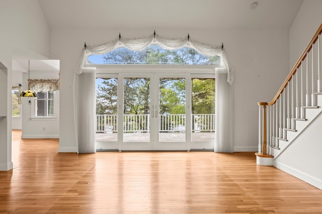 47 Cove View Dr, South Yarmouth, MA 02664 - foyer with plenty of natural light, wood finished floors, and stairway