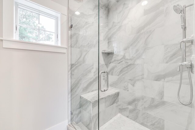 bathroom featuring walk in shower