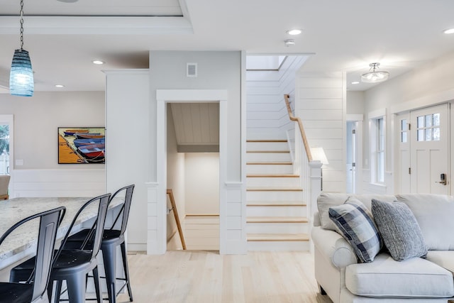 interior space with light wood-type flooring and a wealth of natural light