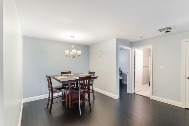 2 Marc Dr Unit 2B2, Plymouth, MA 02360 - dining space with an inviting chandelier, baseboards, dark wood finished floors, and visible vents