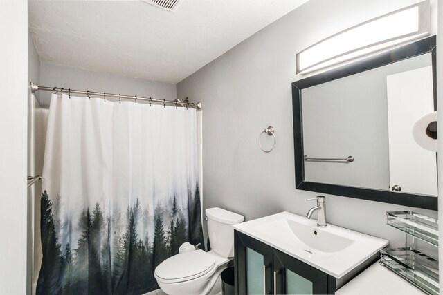 2 Marc Dr Unit 2B2, Plymouth, MA 02360 - full bathroom with toilet, vanity, and a shower with curtain