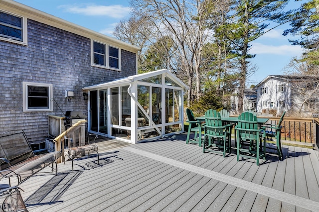 51 Buccaneer Way, Mashpee, MA 02649 - wooden deck with a sunroom and outdoor dining area
