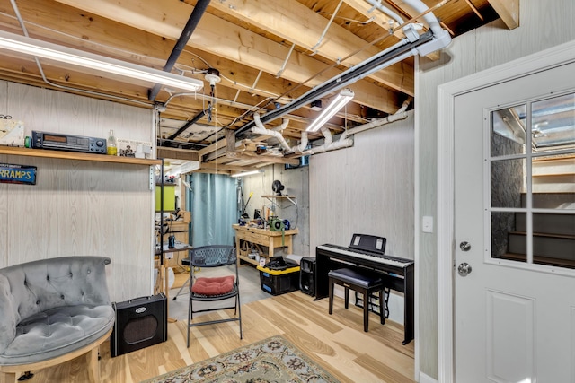 51 Buccaneer Way, Mashpee, MA 02649 - unfinished basement with wood finished floors and a workshop area