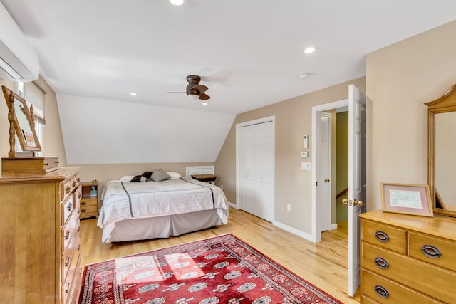51 Buccaneer Way, Mashpee, MA 02649 - bedroom featuring light wood-style floors, a wall mounted air conditioner, recessed lighting, a ceiling fan, and a closet