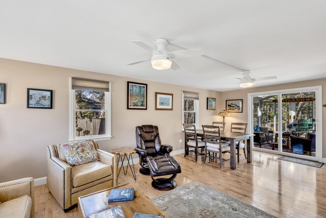 51 Buccaneer Way, Mashpee, MA 02649 - living room featuring ceiling fan, light wood-style floors, and baseboards