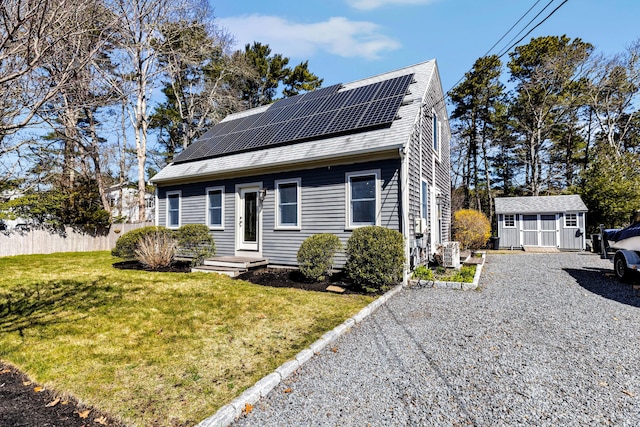 51 Buccaneer Way, Mashpee, MA 02649 - view of front of house featuring roof mounted solar panels and a shingled roof