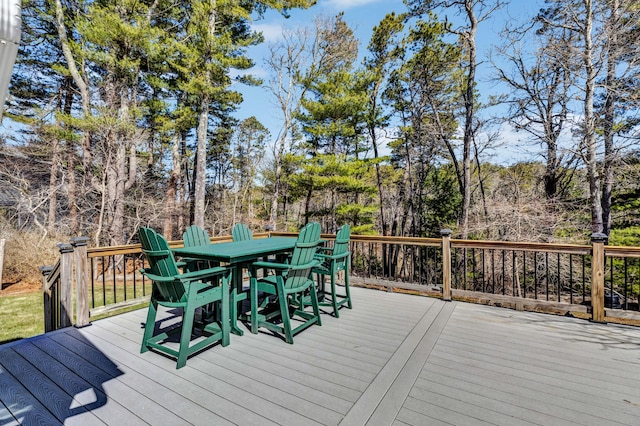 51 Buccaneer Way, Mashpee, MA 02649 - wooden terrace featuring outdoor dining space and view of wooded area