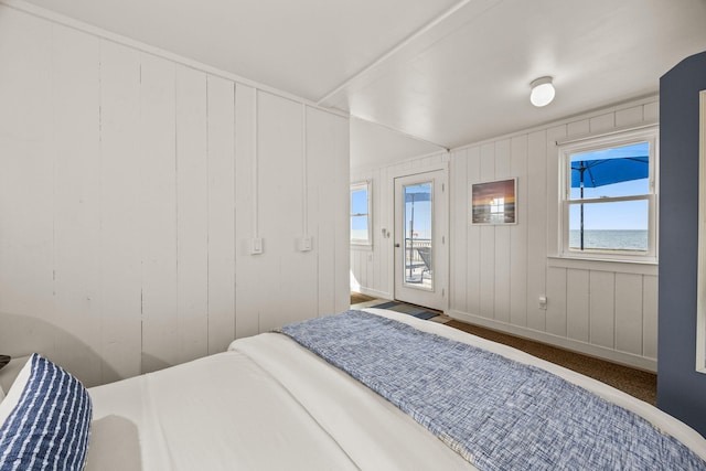 334 Shore Rd # 1, Truro, MA 02666 - bedroom with multiple windows, access to exterior, and baseboards