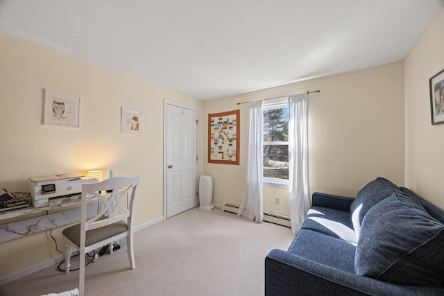 office with a baseboard heating unit, light carpet, and baseboards