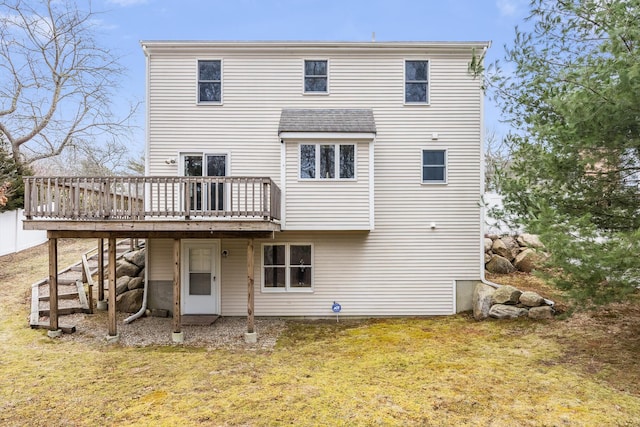 105 Edgewater Dr W, East Falmouth, MA 02536 - back of house with a deck and a lawn