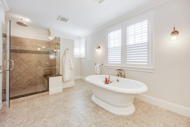 66 Simons Rd Unit C, Mashpee, MA 02649 - full bathroom featuring a shower stall, a freestanding bath, ornamental molding, and tile patterned flooring