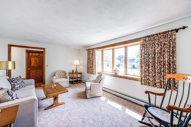 living room with carpet and a baseboard heating unit