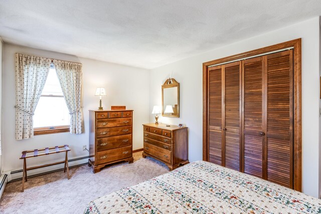 bedroom featuring a closet and carpet floors