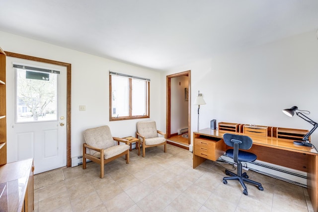 office area with a baseboard heating unit