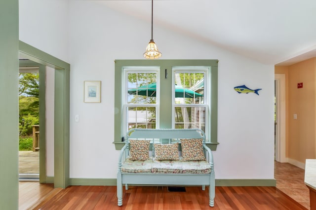 61 Bay Rd, North Falmouth, MA 02556 - living area with wood finished floors, lofted ceiling, and baseboards