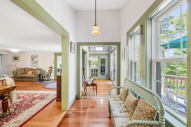 61 Bay Rd, North Falmouth, MA 02556 - foyer entrance featuring plenty of natural light, light wood-style flooring, french doors, and a high ceiling