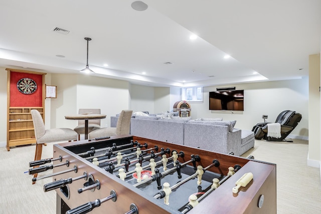 game room featuring light colored carpet