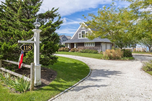 view of front of home with a front yard