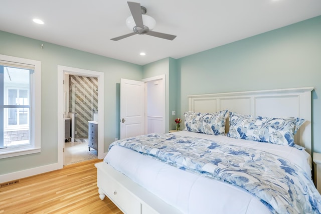 bedroom featuring ceiling fan and light hardwood / wood-style flooring