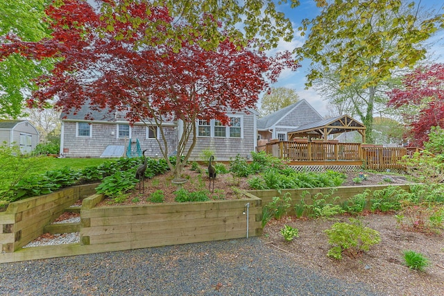 back of property with a deck