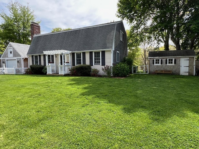 114 Stoney Cliff Rd, Centerville, MA 02632 - colonial inspired home with a chimney, roof with shingles, and a gambrel roof