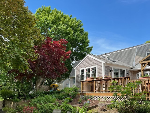 114 Stoney Cliff Rd, Centerville, MA 02632 - rear view of property featuring a wooden deck and a shingled roof