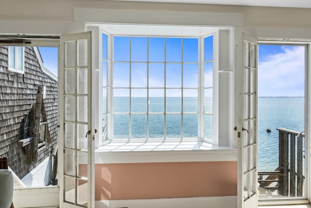 561 Commercial St, Provincetown, MA 02657 - entryway with french doors, a healthy amount of sunlight, and a water view