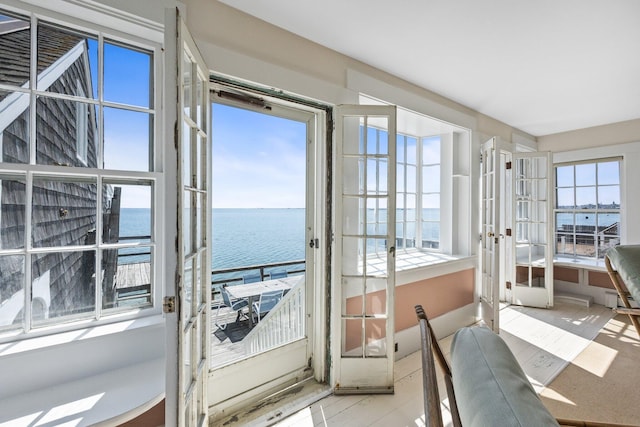 561 Commercial St, Provincetown, MA 02657 - sunroom / solarium featuring french doors and a water view