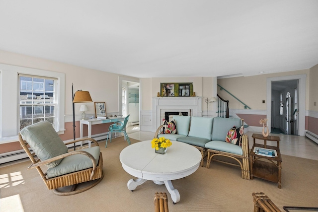 561 Commercial St, Provincetown, MA 02657 - living area featuring a fireplace and stairway